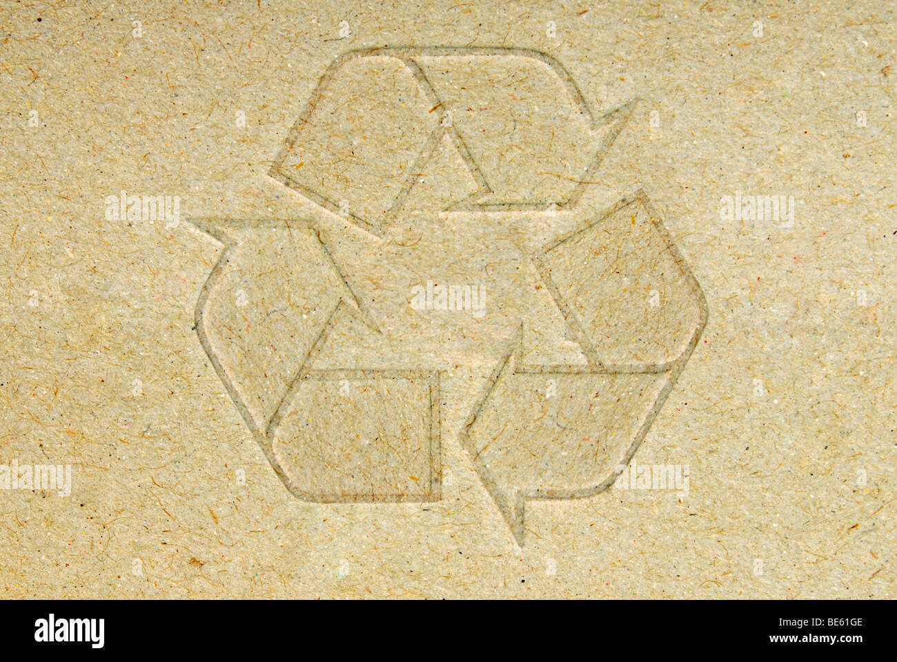 Recycling symbol on cardboard Stock Photo