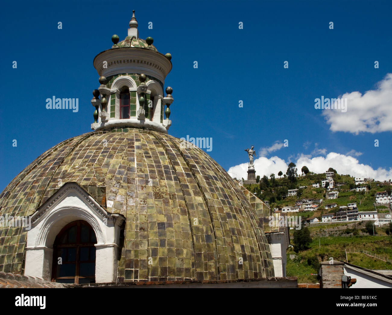 Ecuador.Quito.Dome of The Old Hospital San Juan de Dios (XVI century) current City Museum.Virgin of Quito in background. Stock Photo