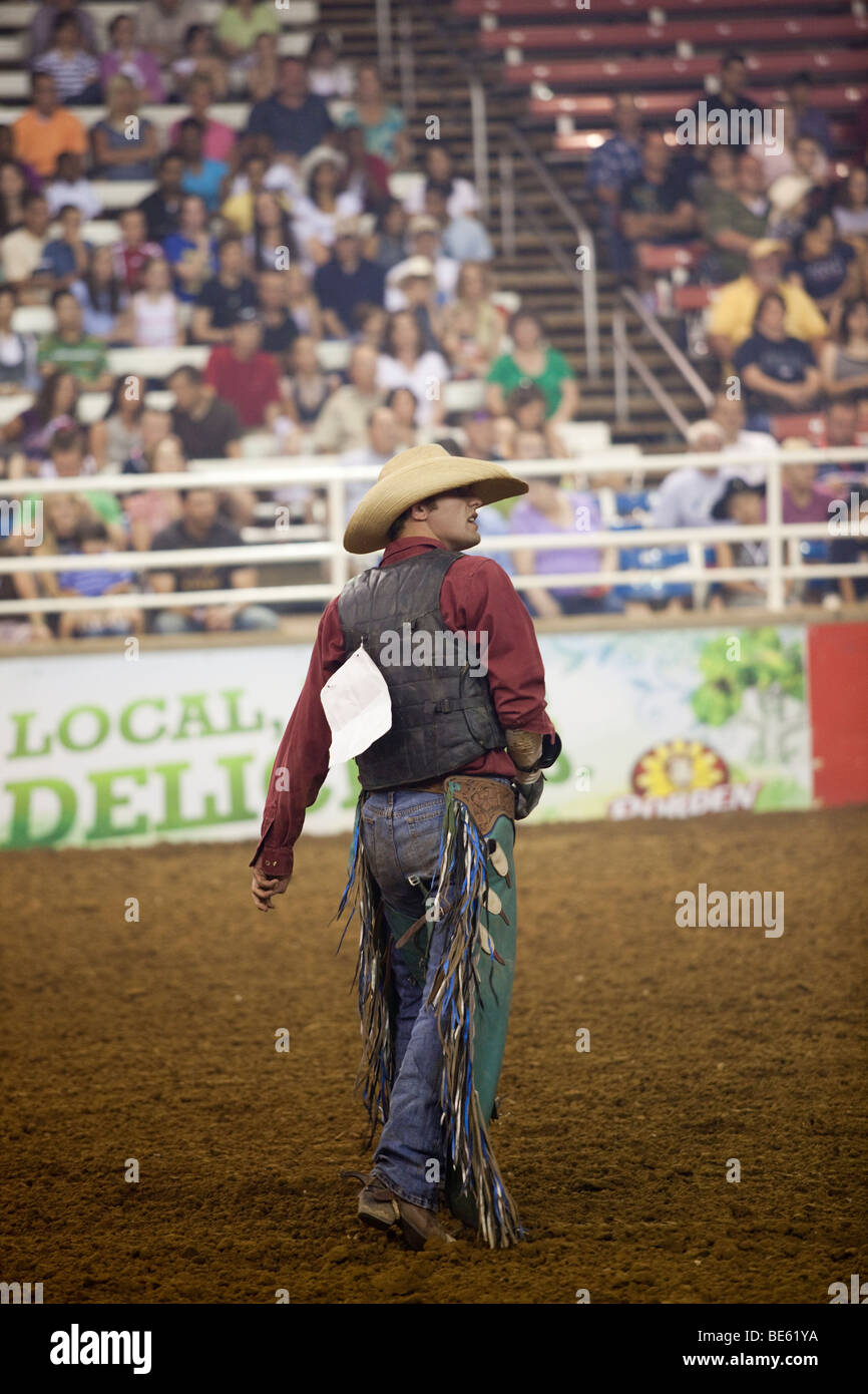 Rodeo Cowboy competing in the Mesquite Championship Rodeo, Texas, USA