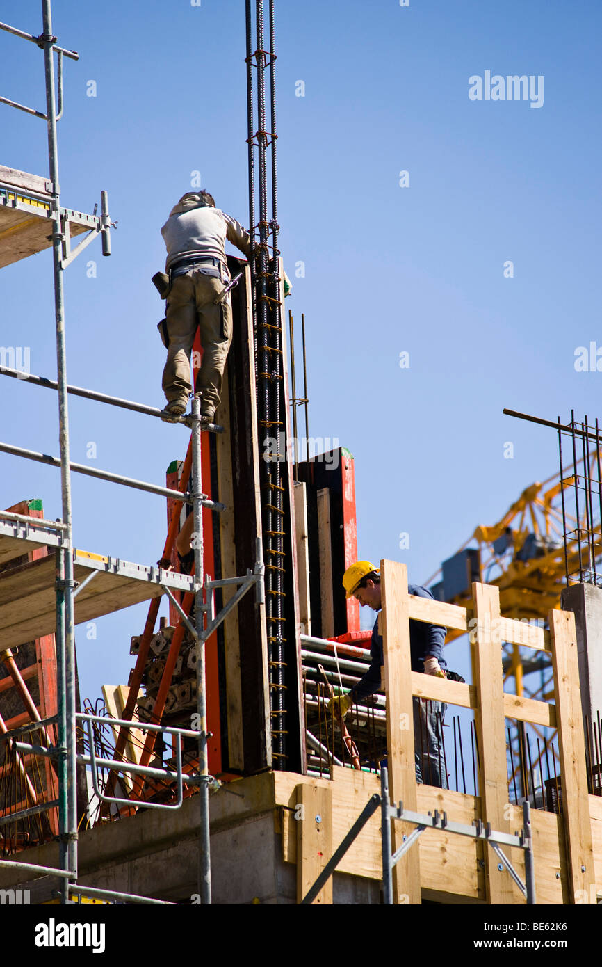 Construction workers on a large construction site in Berlin, Germany