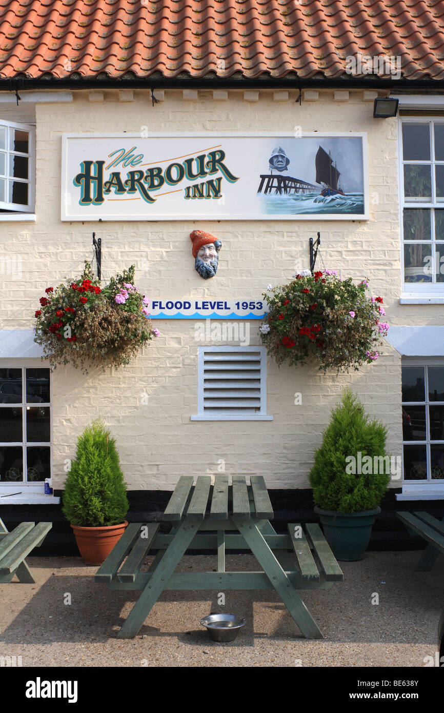 The Harbour Inn public house in the harbour at Southwold, Suffolk, England, UK. It has a sign marking the flood level of 1953. Stock Photo