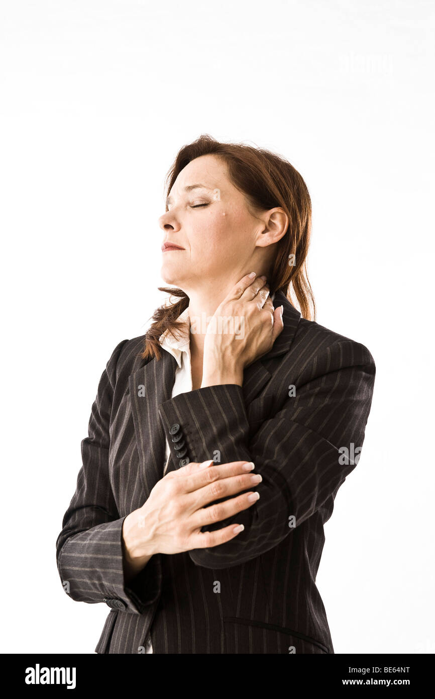 Businesswoman, neck aching Stock Photo - Alamy