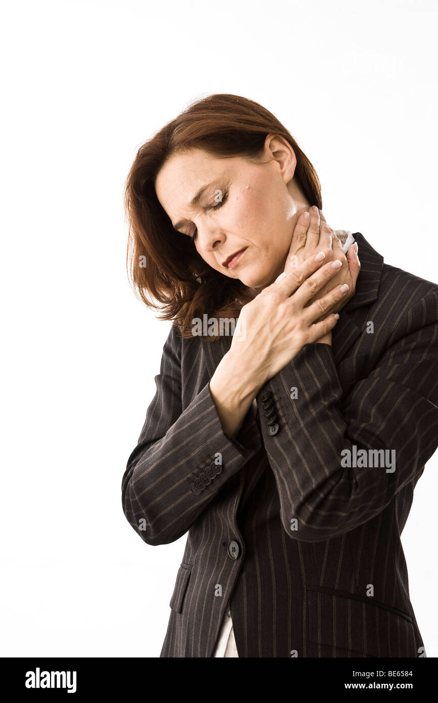 Businesswoman, neck aching Stock Photo - Alamy
