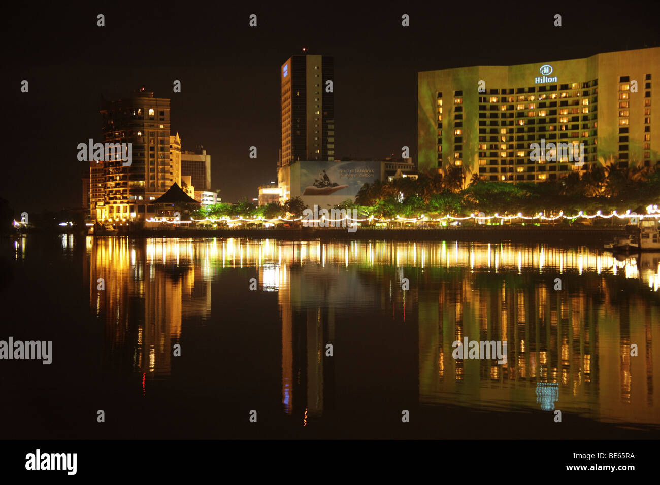 Hilton Hotel, Kuching Waterfront and Sarawak River, Kuching, Sarawak, Borneo, Malaysia, Southeast Asia Stock Photo
