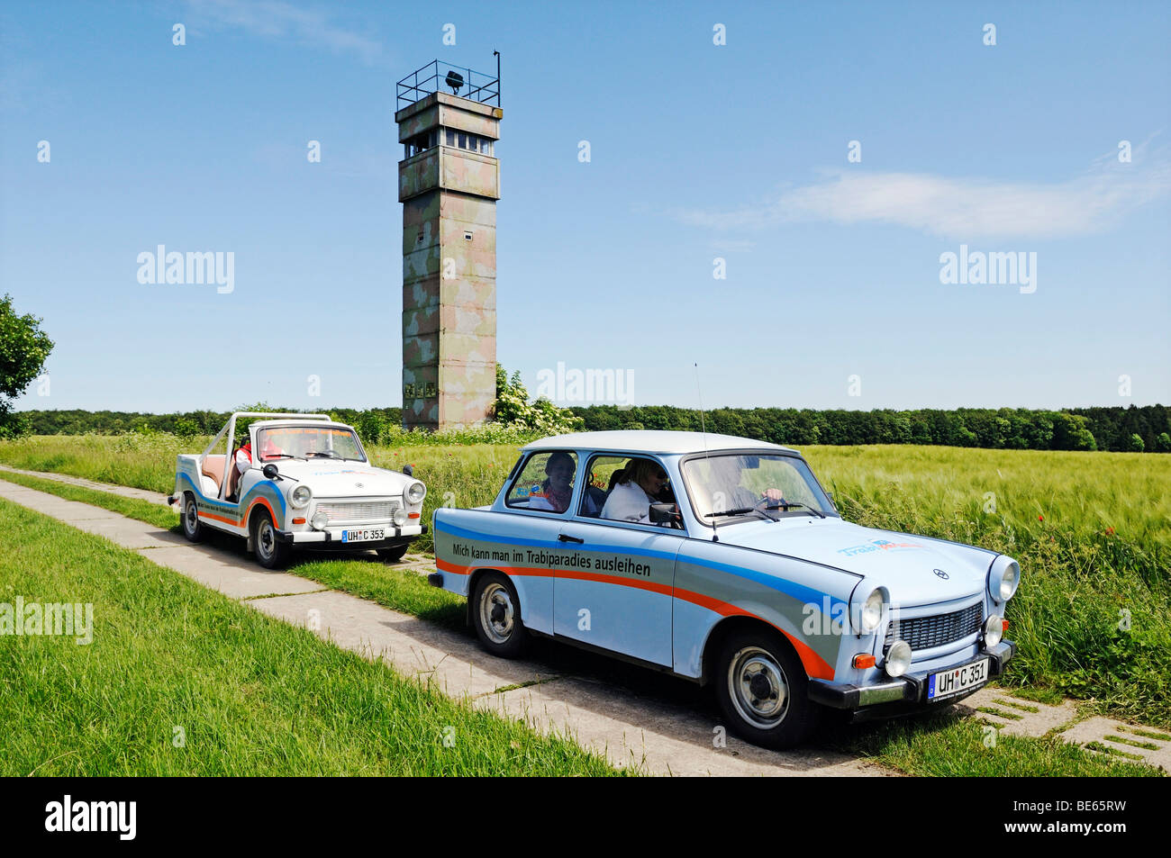 Trabi cars in front of the observation tower of the GDR at the former inner-German border, Katharinenberg, Wendeleben, Thuringi Stock Photo