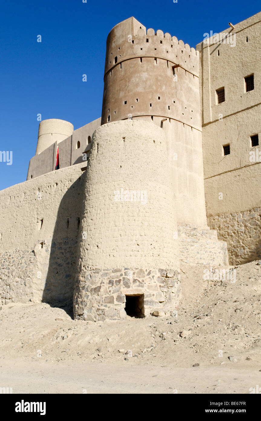 Historic adobe fortification Bahla fort or castle, UNESCO World ...