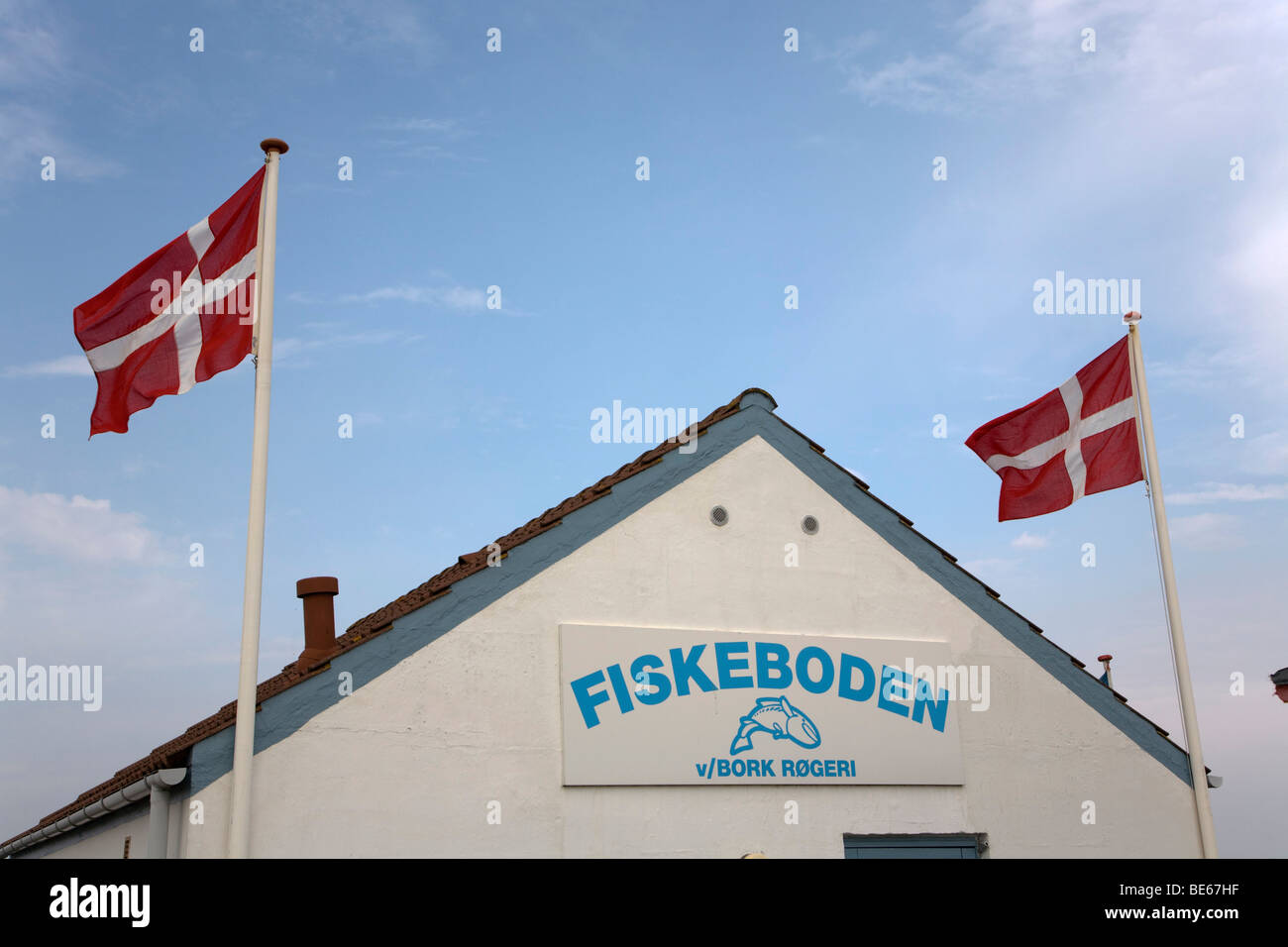 Danish flags on a small fish shop, in Bork Havn at Ringkoebing Fjord, West Jutland, Denmark, Europe Stock Photo