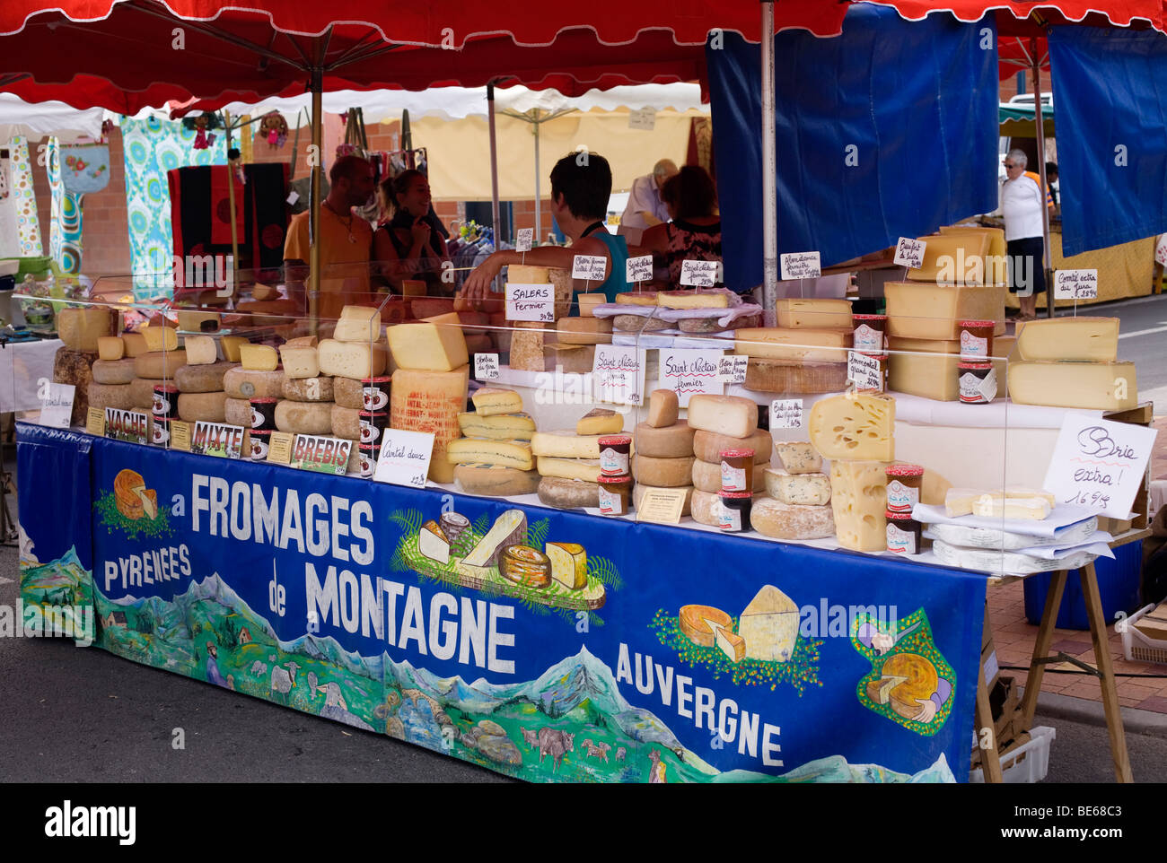 Cheese stall on the weekly market at Lacanau Ocean on the Atlantic south west coast of France in the Bordeaux region Stock Photo