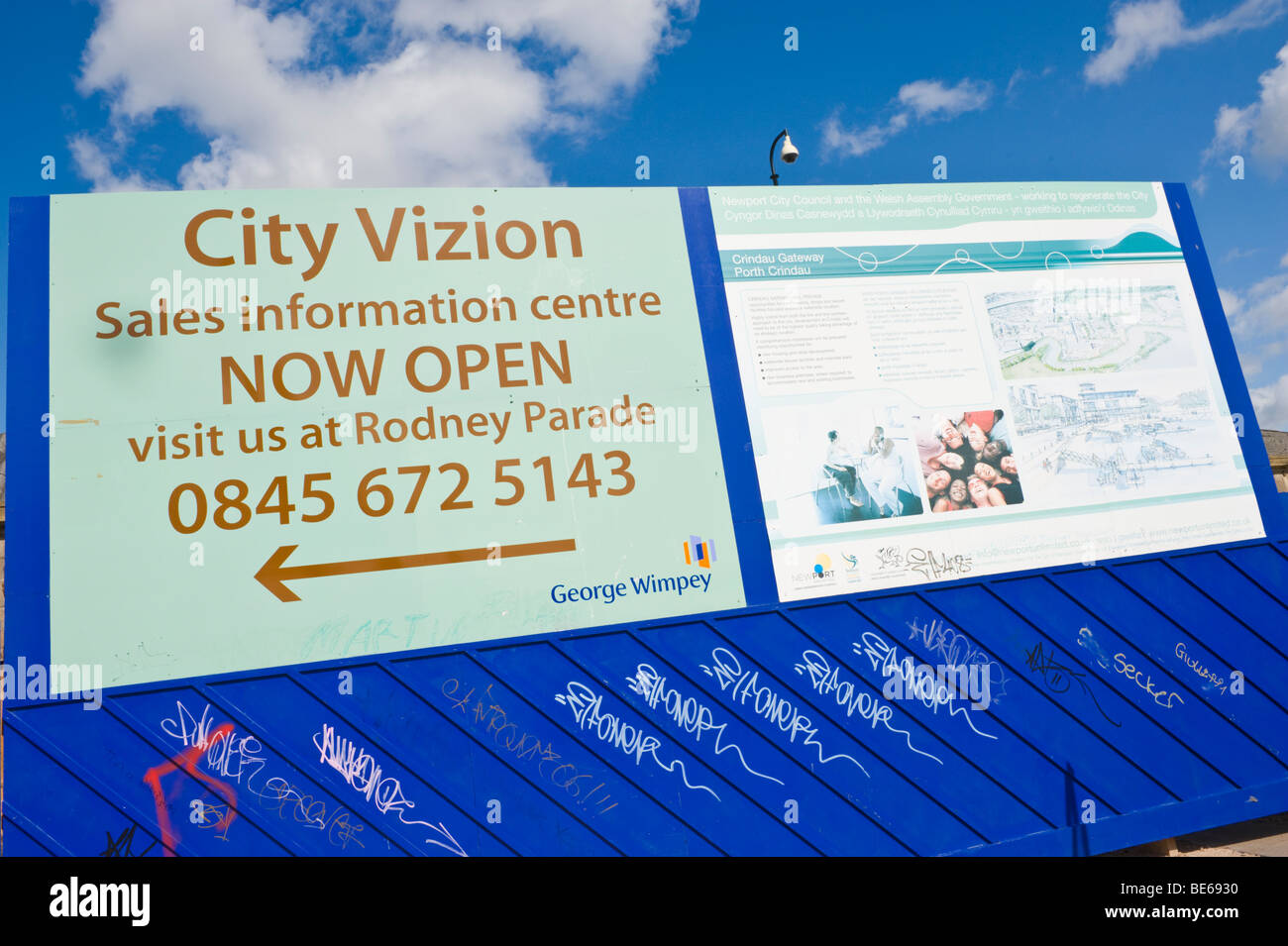 Billboard for local housing development with cctv security canera above in Newport South Wales UK Stock Photo