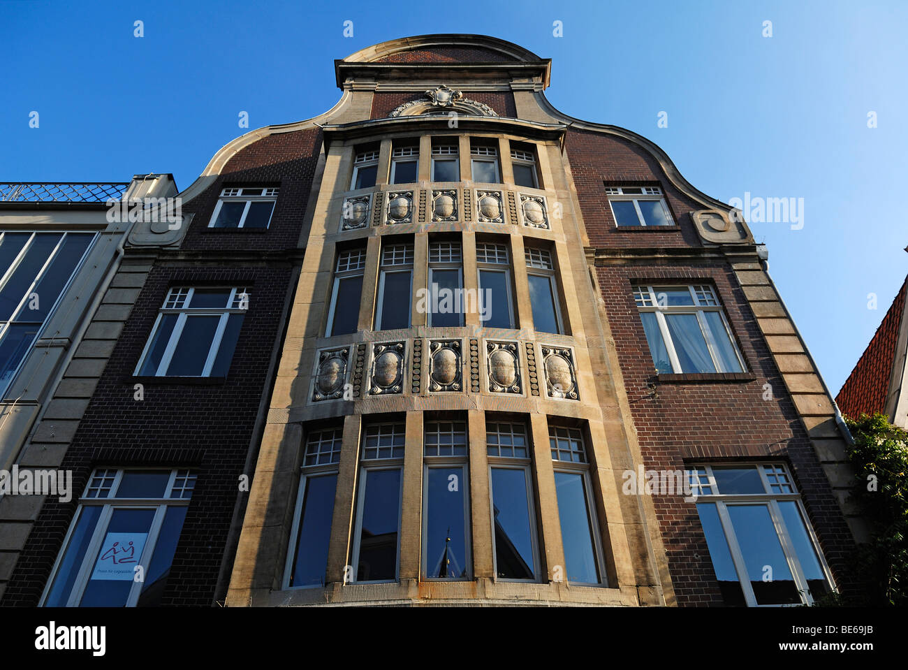 Art Deco facade against blue sky, Lueneburg, Lower Saxony, Germany 