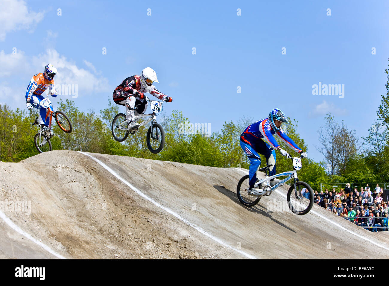 Three jumping competitors at the BMX Supercross World Cup in Copenhagen, Denmark, Europe Stock Photo