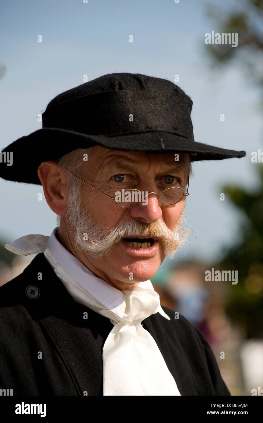 man with full set moustache dressed as parson Stock Photo