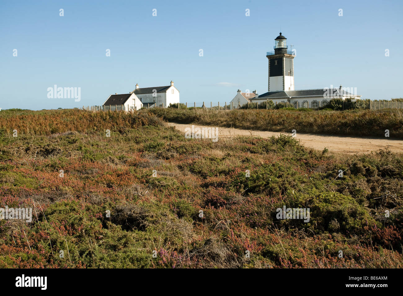 pen men lighthouse in wild moor, groix island, brittany, france Stock