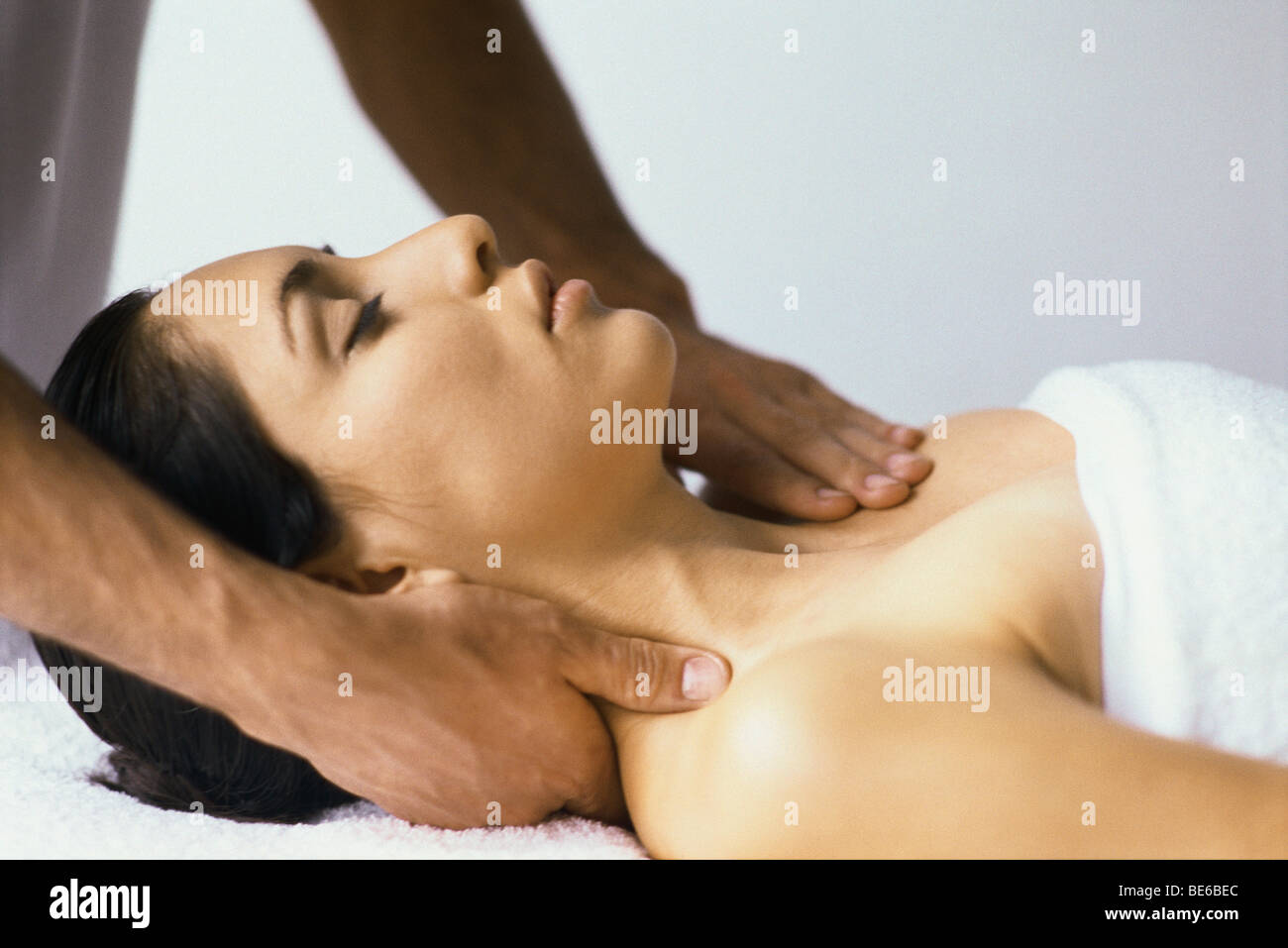 Woman enjoying massage Stock Photo