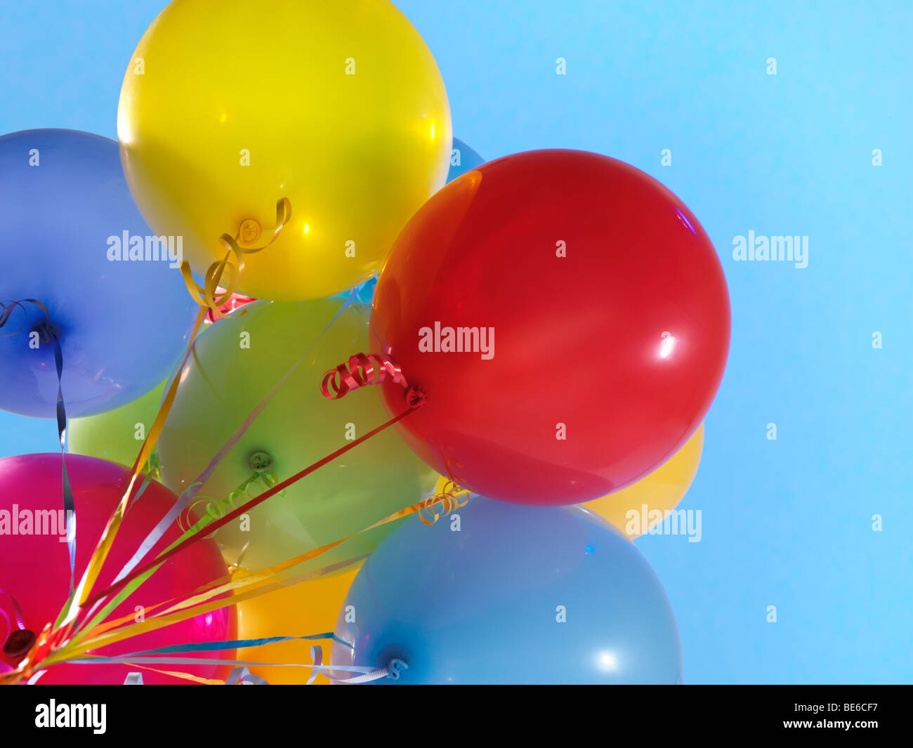 Colorful air balloons over blue sky background Stock Photo