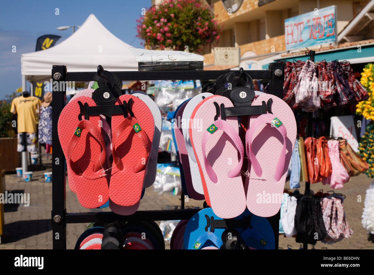 Flip Flops for sale at a beach front shop in Lacanau Ocean on the Atlantic south west coast of France in the Bordeaux Region Stock Photo