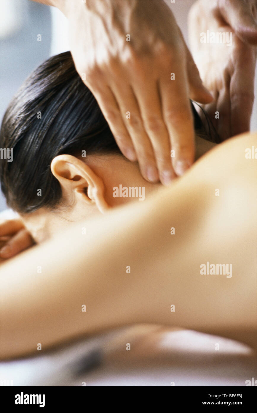 Woman receiving neck massage, cropped view Stock Photo