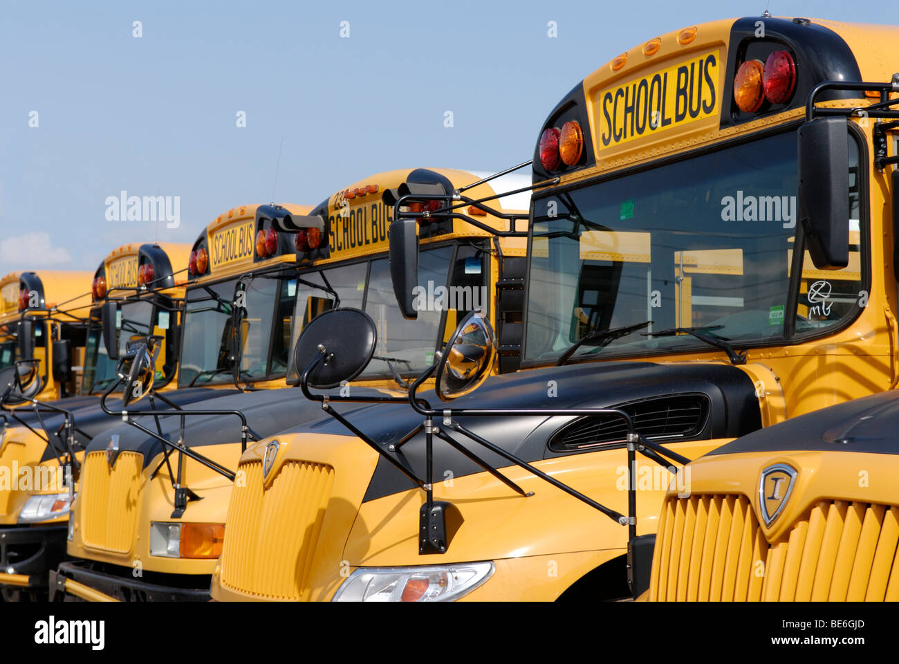 School buses parked Stock Photo