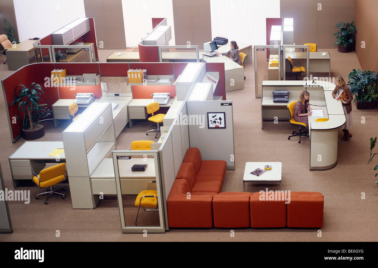 1980s overview of open plan space offices with people Stock Photo