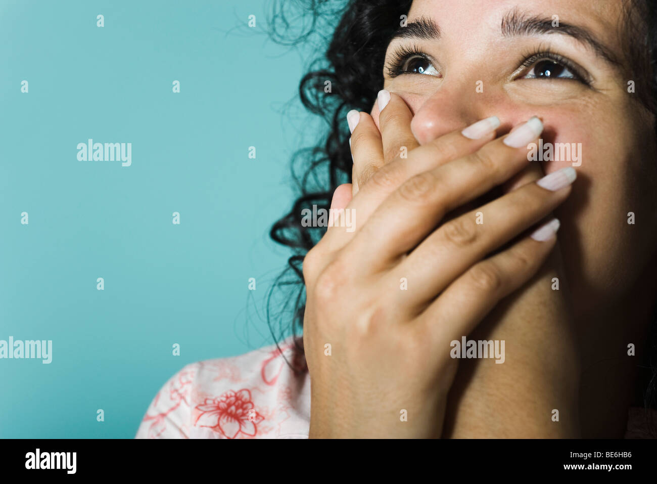Laughter and covering mouth hi-res stock photography and images - Alamy