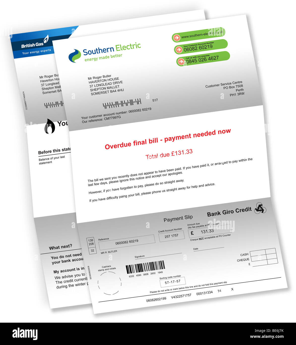 Household energy bills (gas and electricity) on white background. Stock Photo