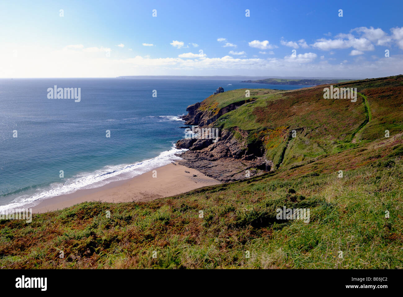 A secluded sandy beach on the Cornish coastline Stock Photo