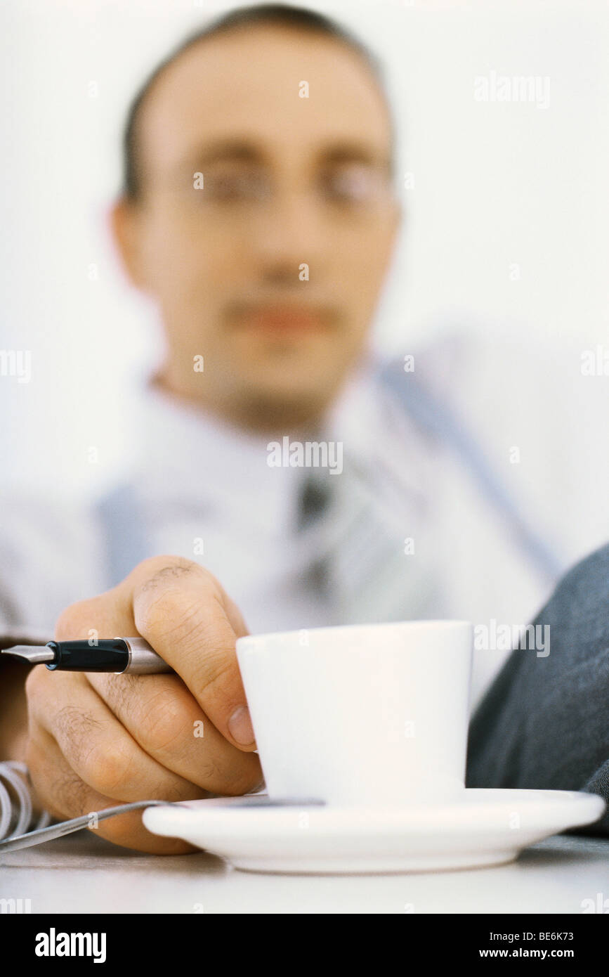 Businessman on coffee break Stock Photo