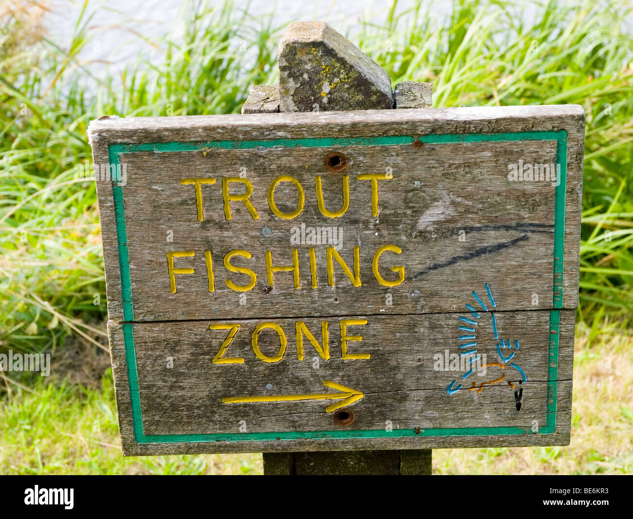 A wooden 'Trout Fishing Zone' sign at Colwick Country Park