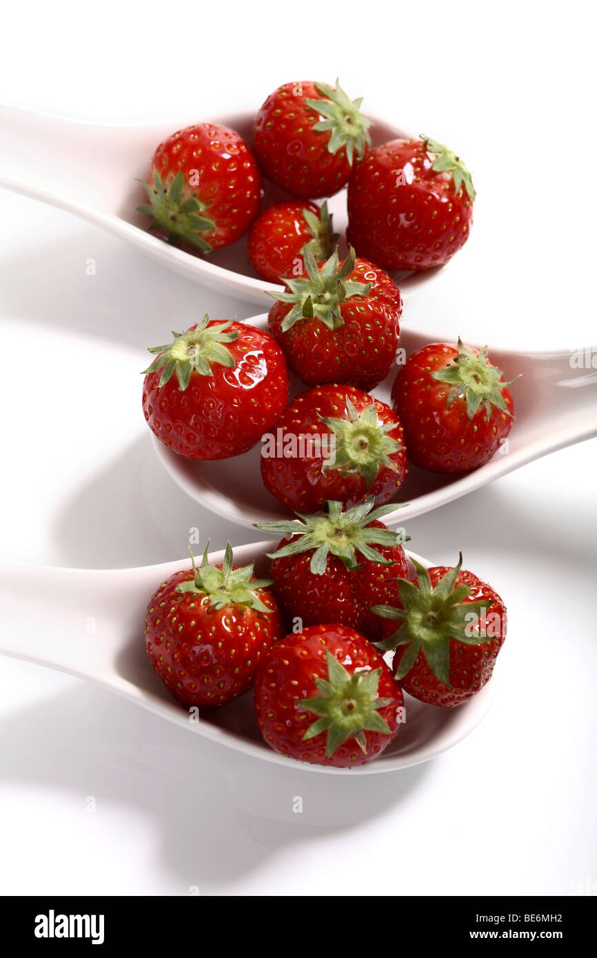 Strawberries on spoons Stock Photo
