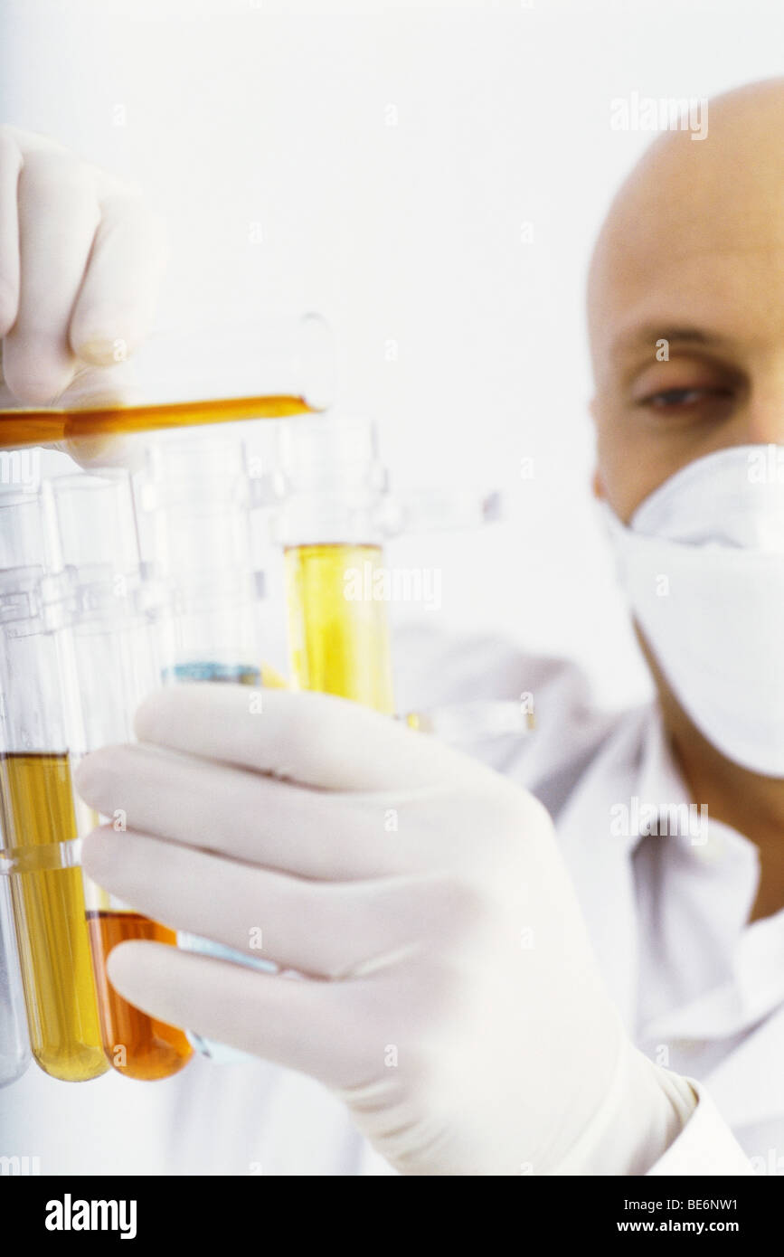 Laboratory technician transferring liquid to test tube Stock Photo Alamy