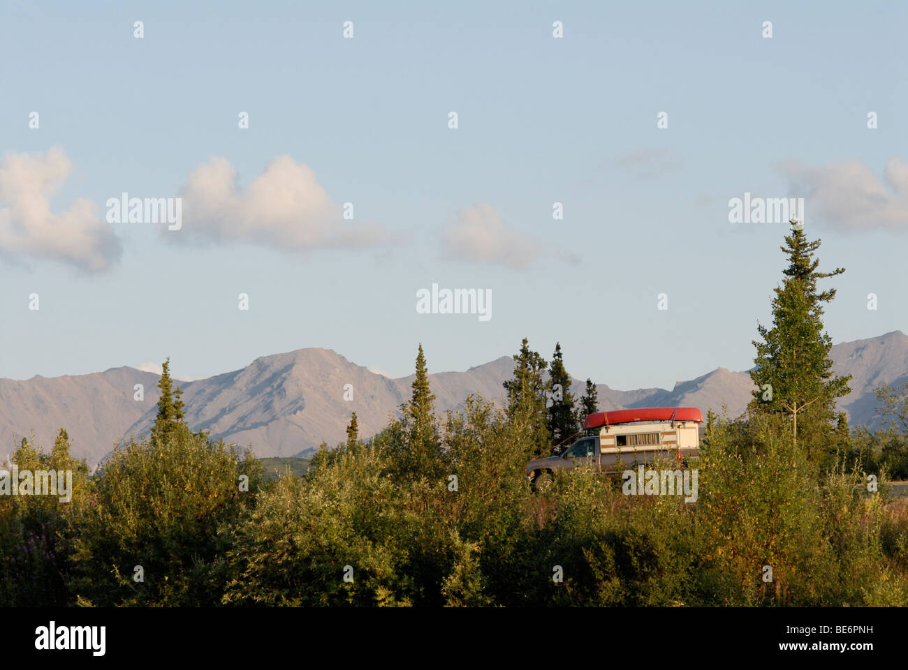 Camper truck with the Alaska Range, Healy Alaska along the Stampede Trail Stock Photo