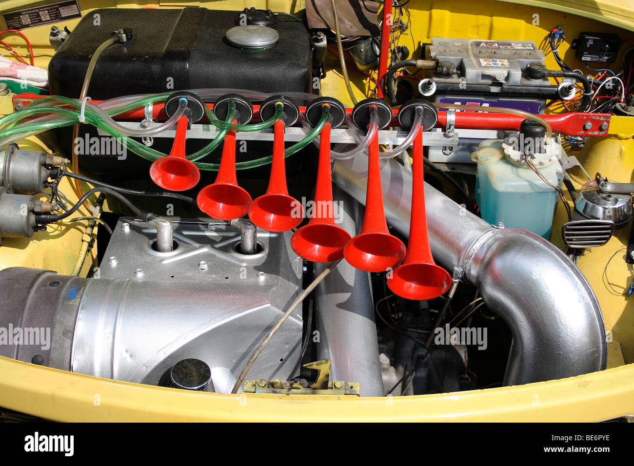 Red fanfare in the engine compartment of a Trabant car Stock Photo