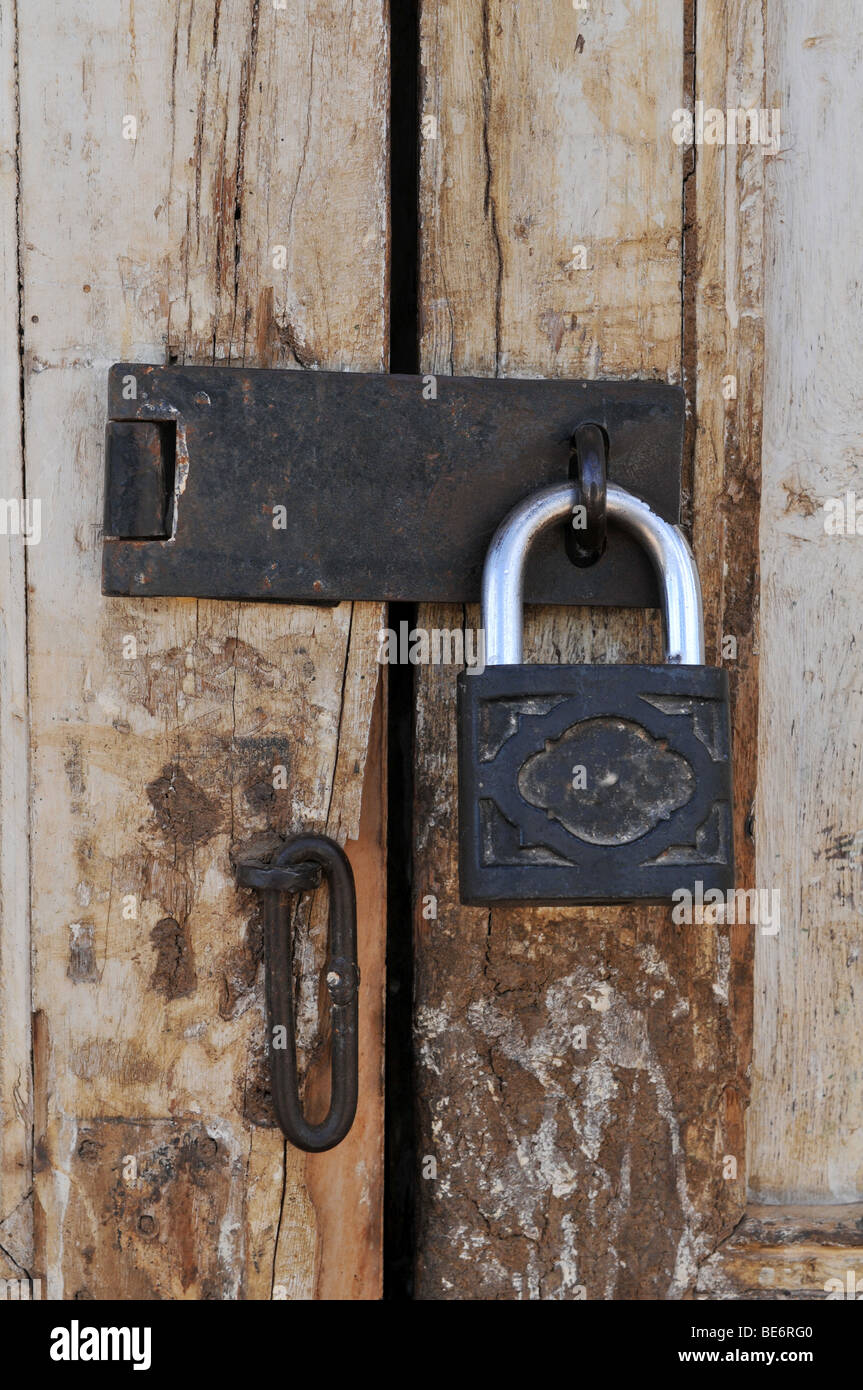 Old grungy door with vintage lock close up Stock Photo - Alamy