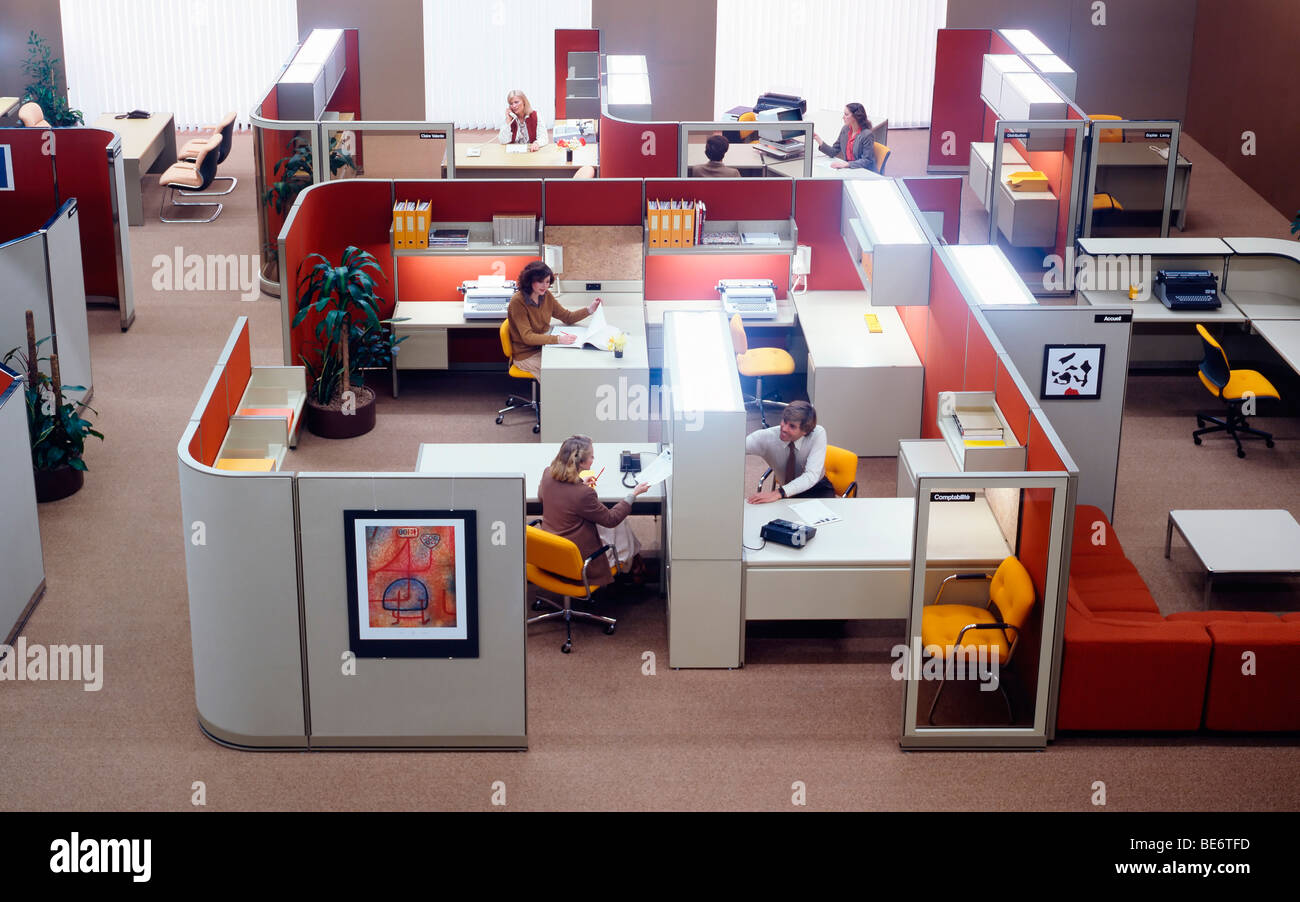 1980s open plan space offices with people overview Stock Photo