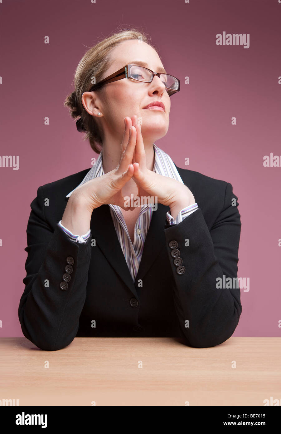 Female boss looking at camera with confident expression Stock Photo