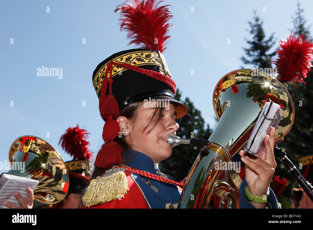 Young woman playing the tuba, local music group, at the Samson Parade, St. Michael, Lungau, Salzburg state, Salzburg, Austria,  Stock Photo