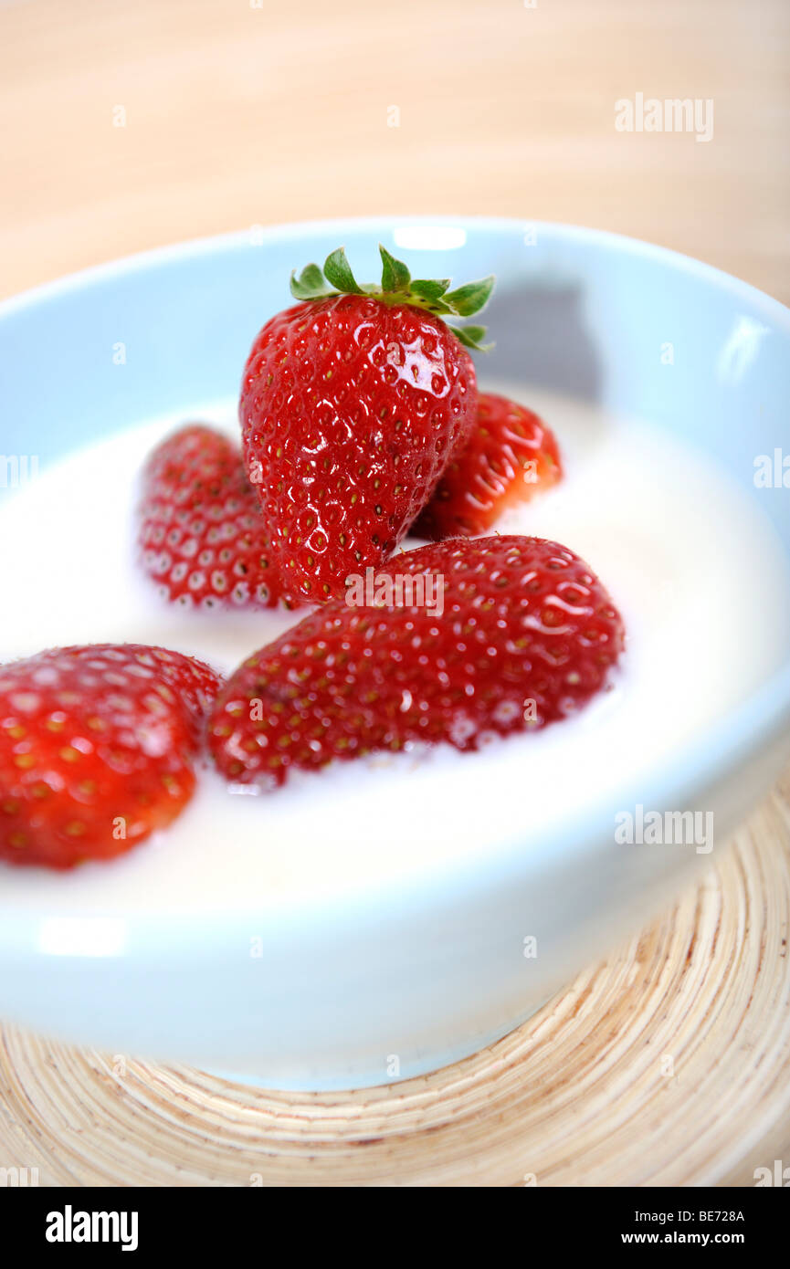 Strawberries with milk Stock Photo