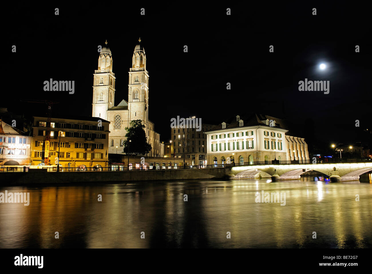 The landmark of Zurich, the twin towers of the Grossmuenster Church, and the Wasserkirche, 'Water Church' to the right, the Lim Stock Photo