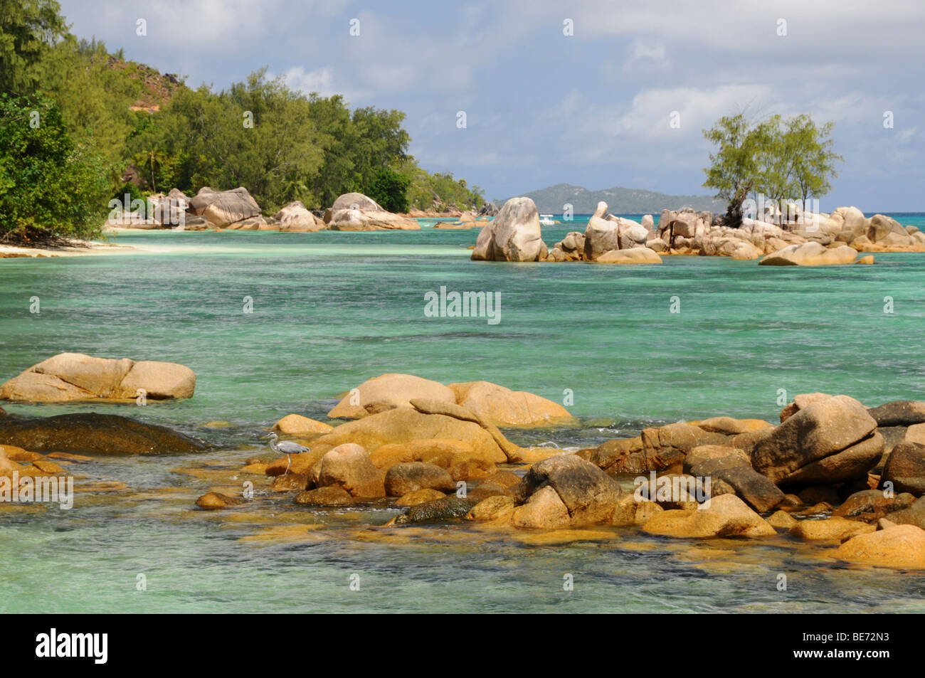 Granite rocks surrounded by the sea, Anse Takamaka, Praslin Island, Seychelles, Africa, Indian Ocean Stock Photo