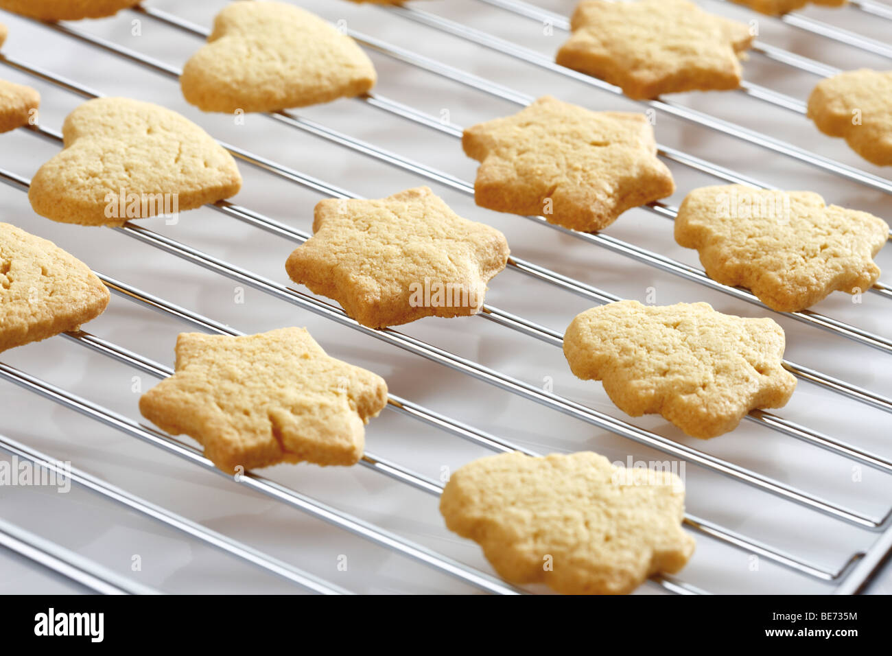 Shortcrust cookies on oven grid Stock Photo