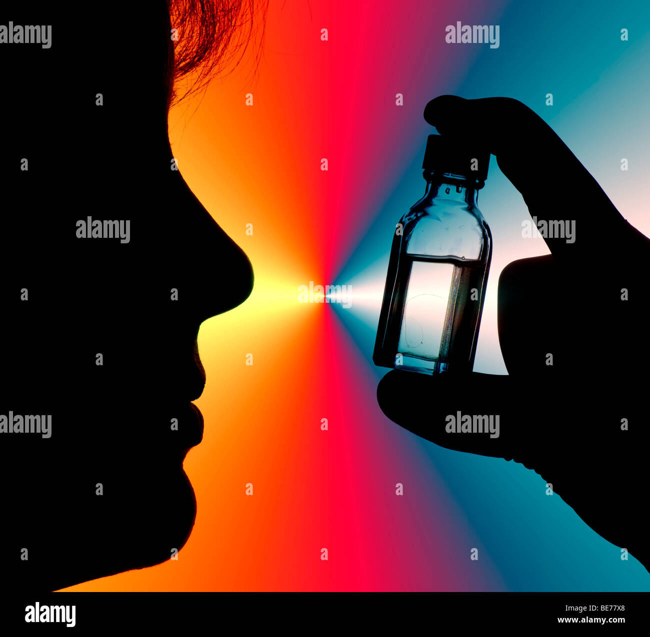 woman doctor examining a vial of medicine Stock Photo