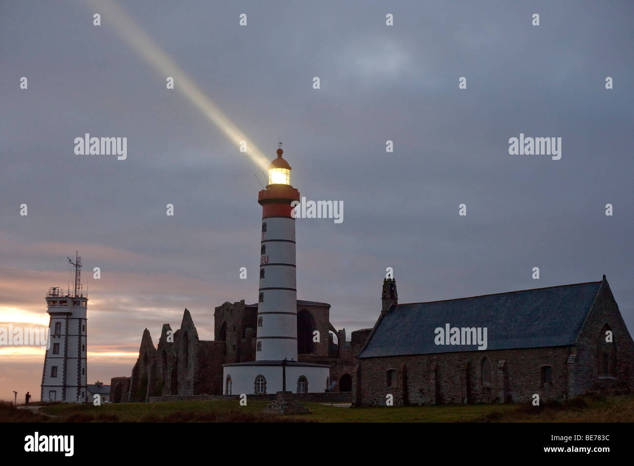 saint mathieu lighthouse lighted, abbey ruins and church, brittany ...