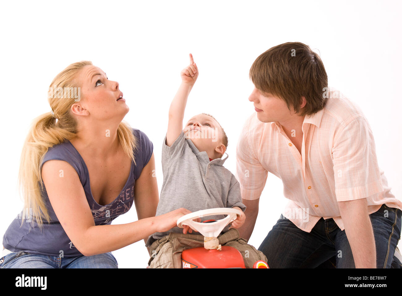 Young couple with their 2-year-old son Stock Photo