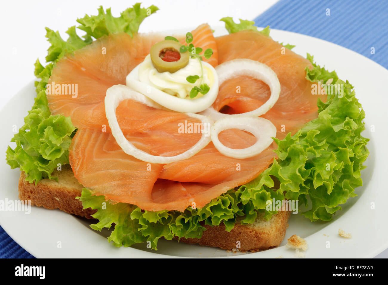 Smoked salmon on toast with lollo bionda, onion rings, egg, mayonnaise