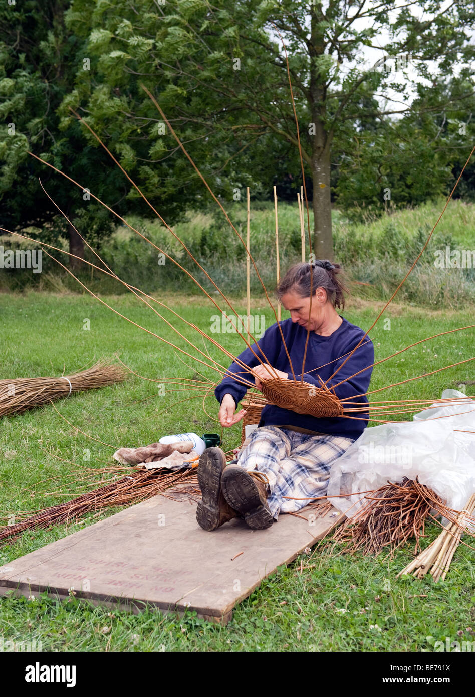 Woman Basket Weaving Stock Photo