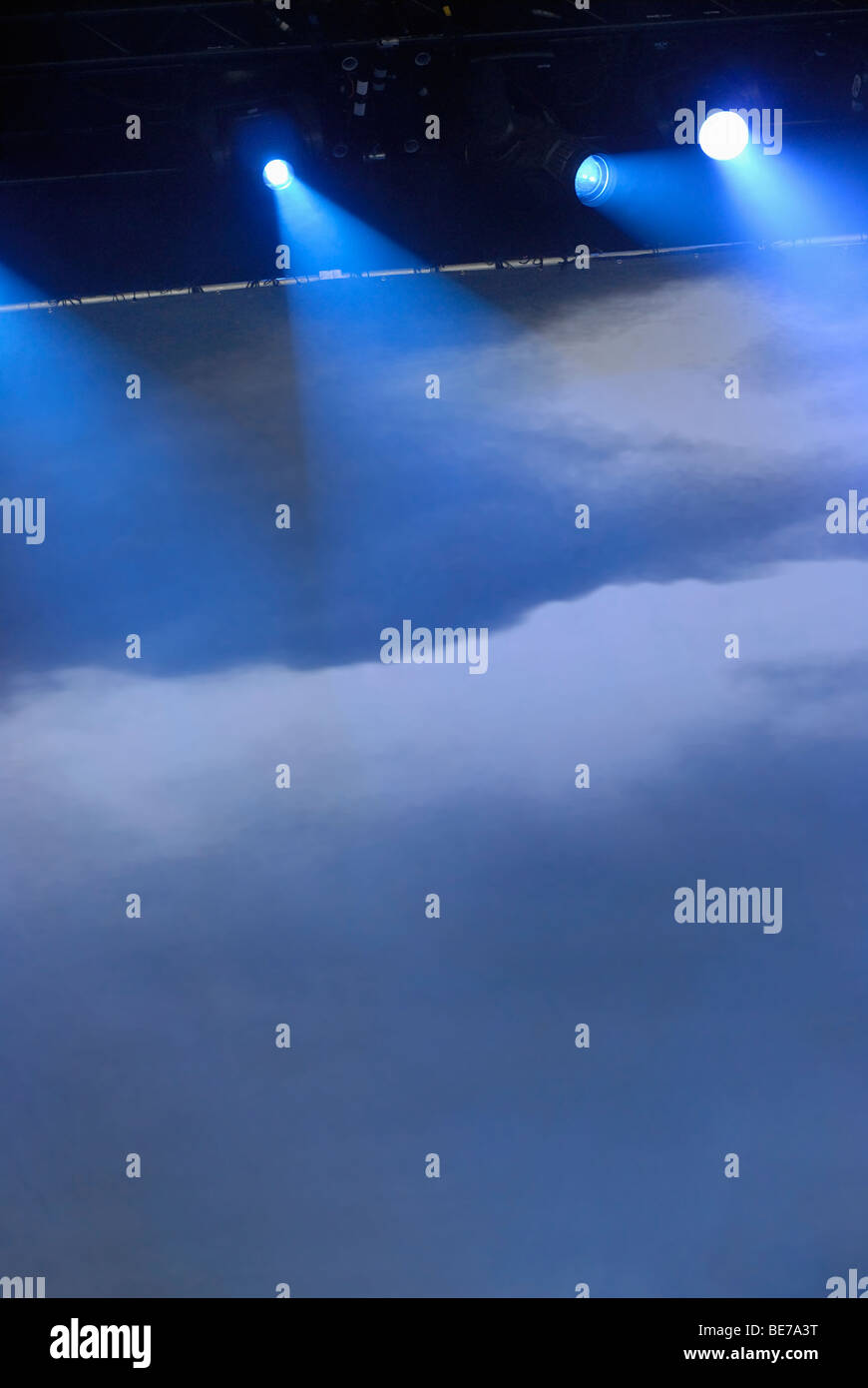 Blue stage lights and fog; concert background. Stock Photo