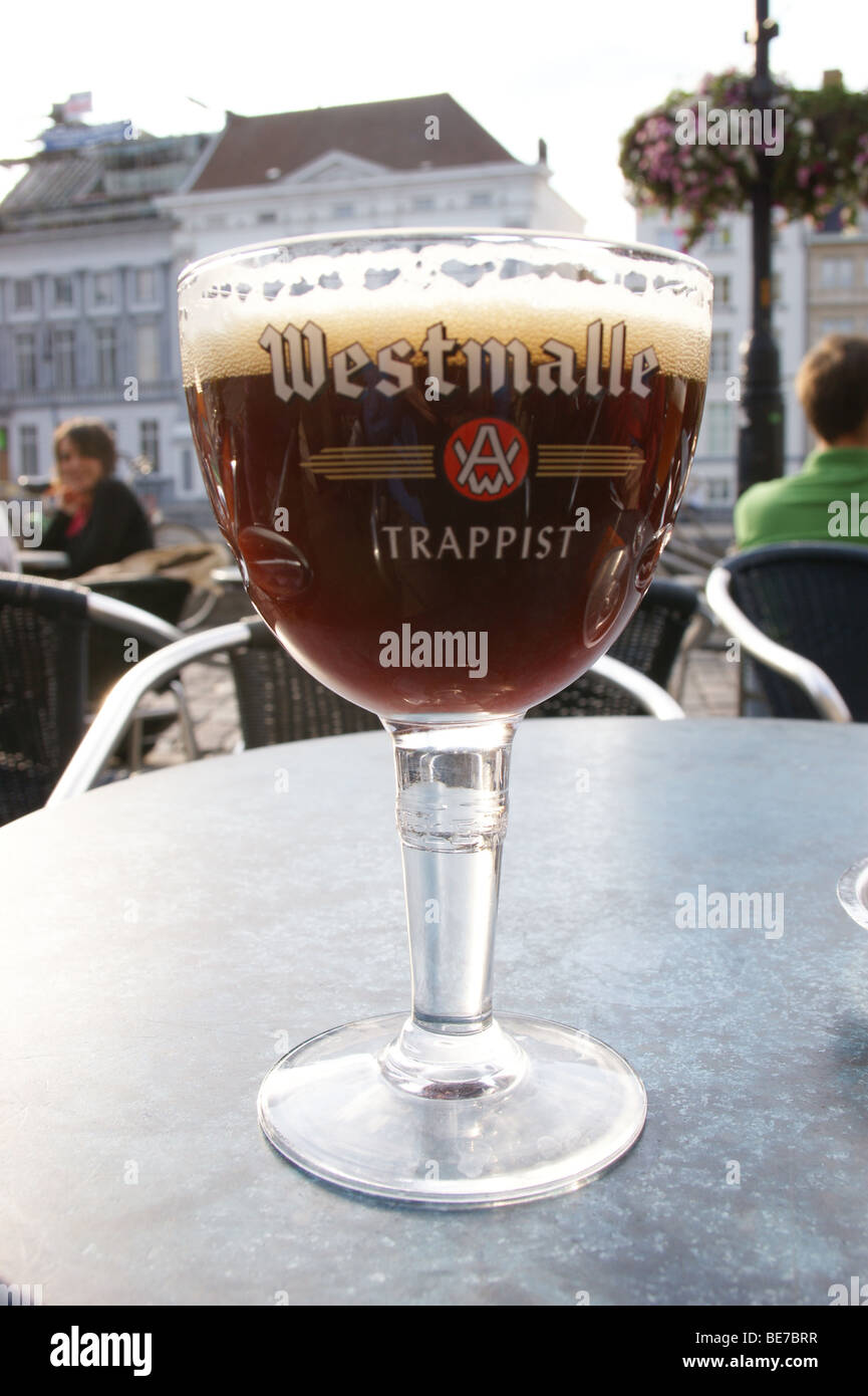 Westmalle Dubbel Trappist Beer at a bar cafe on the Graslei, Gent, Belgium, pub table drinks glasses printed Stock Photo