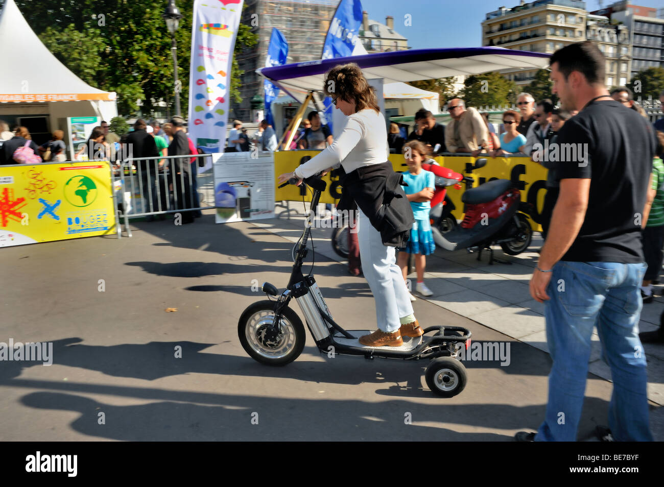 Paris, France, People Visiting Alternative Transportation Show, 'Fete des Transport', Woman Riding 'Electric Scooter' zero carbon europe, street event Stock Photo