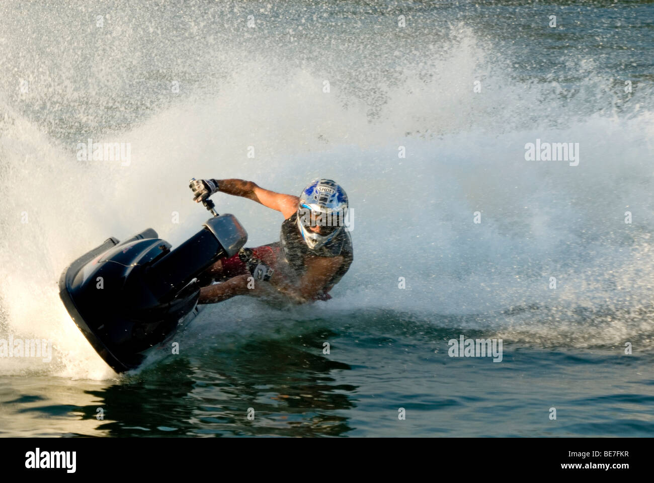 Jet ski racer taking a narrow corner Stock Photo