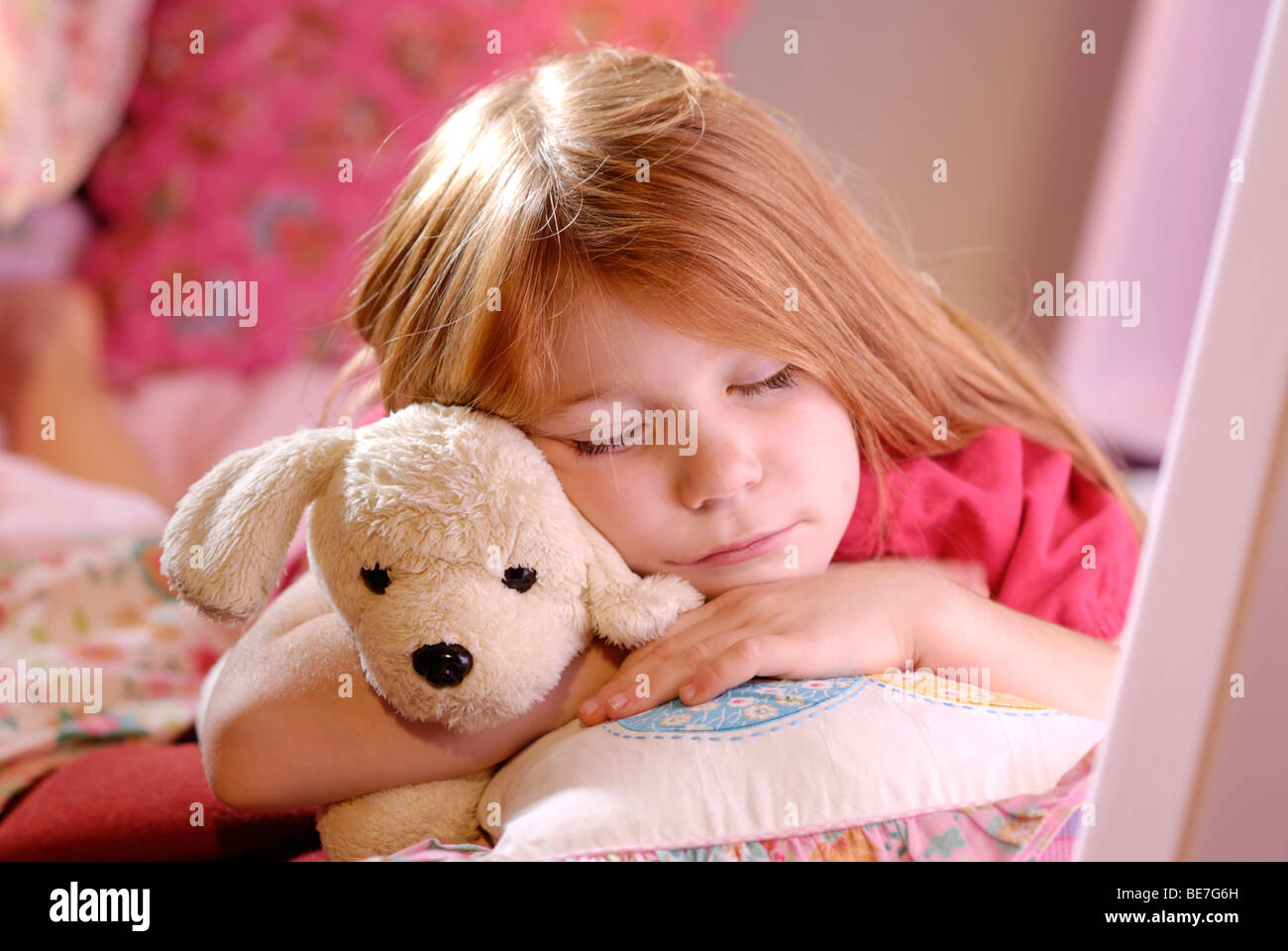 sleeping with a stuffed animal